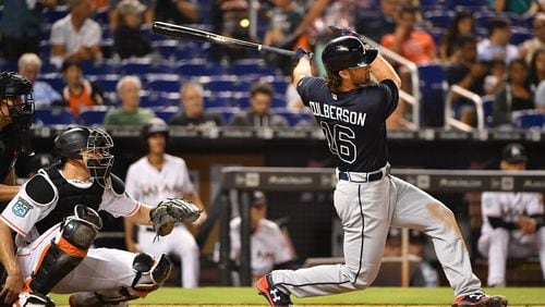 Charlie Culberson  of the Atlanta Braves doubles for an rbi in the sixth inning against the Miami Marlins at Marlins Park on July 23, 2018 in Miami, Florida. (Photo by Mark Brown/Getty Images)