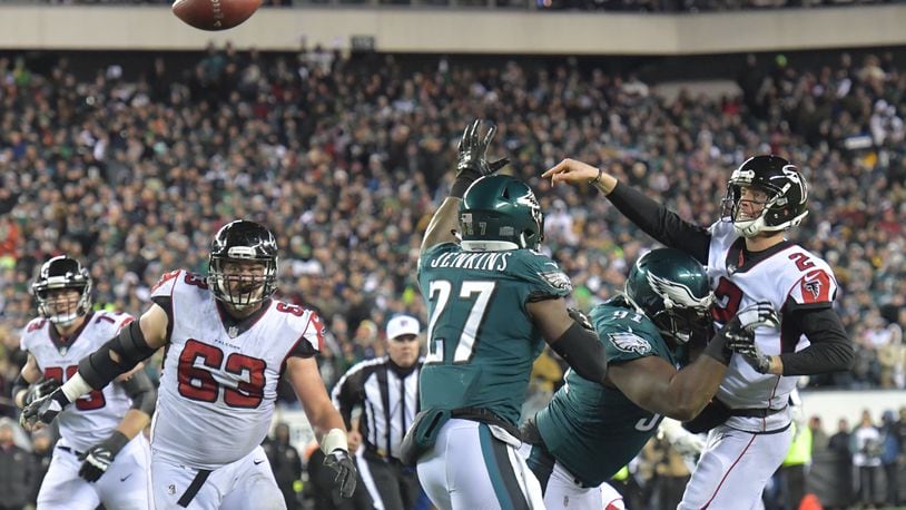 Atlanta Falcons quarterback Matt Ryan (2) gets off a pass under pressure from Philadelphia Eagles defensive tackle Fletcher Cox (91) in the NFC Divisional Game at Lincoln Financial Field in Philadelphia, PA on Saturday, Jan. 13, 2018.