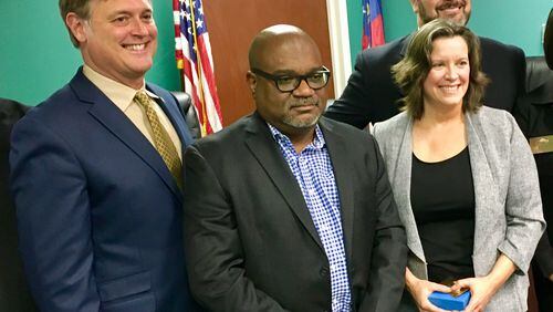 Four-fifths of Avondale Estates’ commission, l-r, Mayor Jonathan Elmore, Lionel Laratte, Lisa Shortell and Brian Fisher. Bill Banks file photo for the AJC