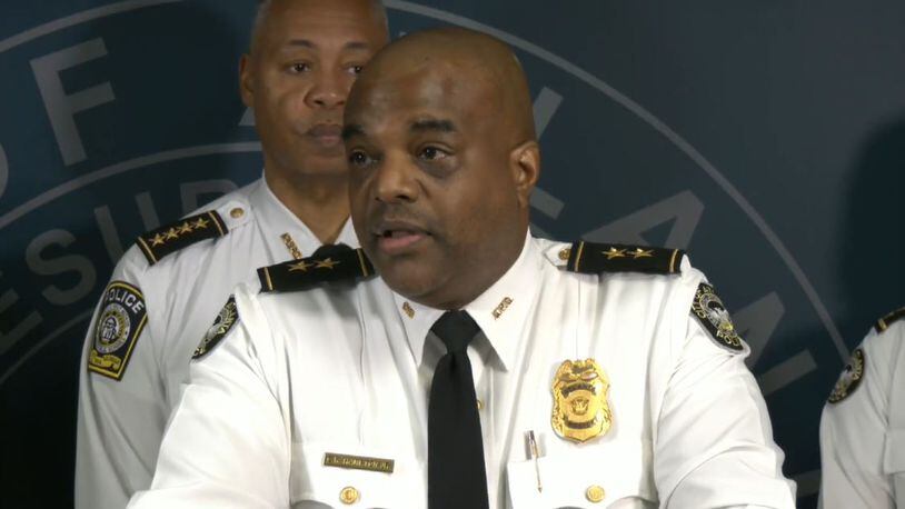 Atlanta police Deputy Chief Charles Hampton Jr. announced two arrests Wednesday in a deadly shooting on the 17th Street bridge.