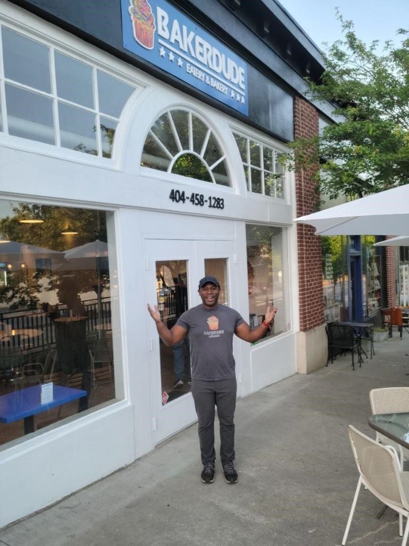 Orran Booher, founder and owner of Baker Dude, outside the Emory Village location.