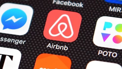 The Airbnb app logo is displayed on an iPhone on Aug. 3, 2016.
