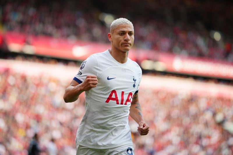 Tottenham's Richarlison celebrates scoring his side's first goal during the English Premier League soccer match between Liverpool and Tottenham Hotspur at Anfield Stadium in Liverpool, England, Sunday, May 5, 2024. (AP Photo/Jon Super)