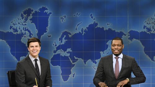 In this March 4, 2017 photo provided by NBC, Colin Jost and Michael Che, right, appear during Weekend Update segment of "Saturday Night Live" in New York. "Saturday Night Live" will broadcast live simultaneously across the U.S. for its final four shows of the season, NBC announced Thursday, March 16. (Will Heath/NBC via AP)