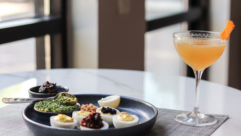 At One Flew South on the Eastside Beltline, you can garnish your deviled eggs with radish matchsticks, fried shallots, smoked salt and black pepper. Bacon jam, tuna poke, caviar and roe can be added for an upcharge. Courtesy of Tori Allen PR