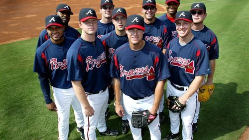 These players were among the Baby Braves in 2005: (left to right, front row: Andy Marte, Blaine Boyer, Kyle Davies (in middle), Kelly Johnson (center front), Pete Orr (far right), back row: Wilson Betemit, Ryan Langerhans (sunglasses), Jeff Francoeur (also w/sunglasses), Roman Colon (black man in back) and Brian McCann (sunglasses) on far right. (KEITH HADLEY/AJC file)