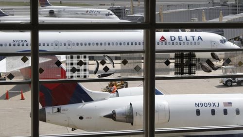 Delta Air Lines has for several years been pressuring the federal government to intervene against three foreign air carriers, Etihad, Emirates and Qatar Airways. It says the carriers, based in Qatar and the United Arab Emirates, are unfairly subsidized by their oil-rich governments, violating the spirit of international aviation trade pacts. (AP Photo/Carolyn Kaster, File)
