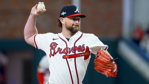 Atlanta Braves relief pitcher Kirby Yates (22) delivers to the Philadelphia Phillies during the fifth inning of NLDS Game 2 in Atlanta on Monday, Oct. 9, 2023.   (Miguel Martinez / Miguel.Martinezjimenez@ajc.com)