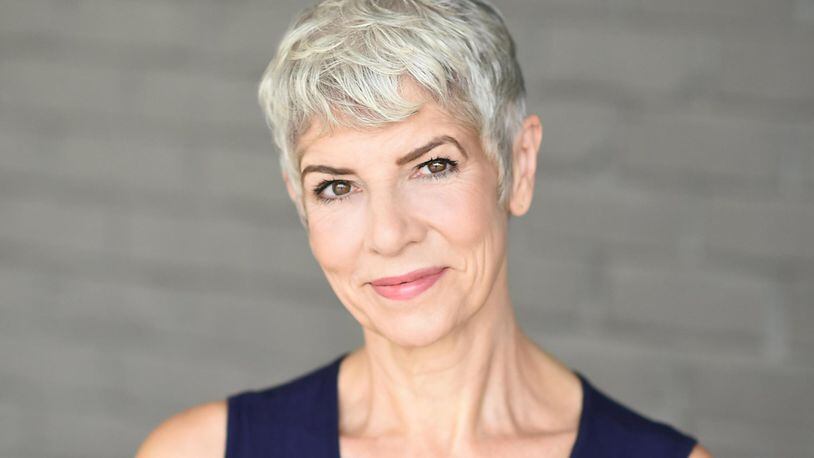 Mary Lynn Owen is the playwright and solo cast member of “Knead.” The play, which runs Nov. 13-Dec. 9 at the Alliance Theatre in Midtown, explores Owen’s background as the daughter of a Cuban mother obsessed with bread making and a straight-laced father raised in Georgia. CONTRIBUTED