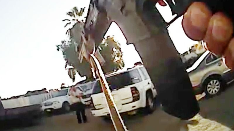 This still image from a Kern County deputy's body camera shows a standoff between deputies and Javier Casarez, 54, moments before Casarez fatally shot himself Wednesday, Sept. 12, 2018, in Bakersfield, California. Kern County Sheriff Donny Youngblood said Casarez killed five other people, including his ex-wife, before turning the gun on himself.