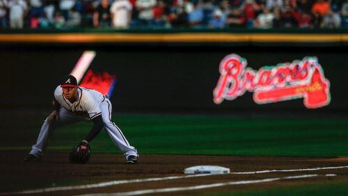 Freddie Freeman readies himself at first base in the first inning during Opening Day against the Philadelphia Phillies at Turner Field on April 1, 2013, in Atlanta.