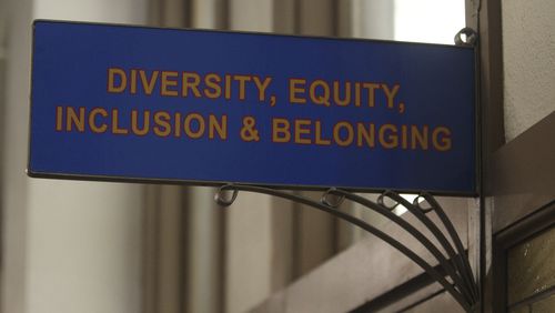 FILE - The sign above the door to the Office of Diversity, Equity, Inclusion and Belonging inside the main administration building on the main University of Kansas campus is seen on Friday, April 12, 2024, in Lawrence, Kan. A conservative quest to limit diversity, equity and inclusion initiatives is gaining momentum in state capitals and college governing boards, with officials in about one-third of the states now taking some sort of action against it. (AP Photo/John Hanna, File)