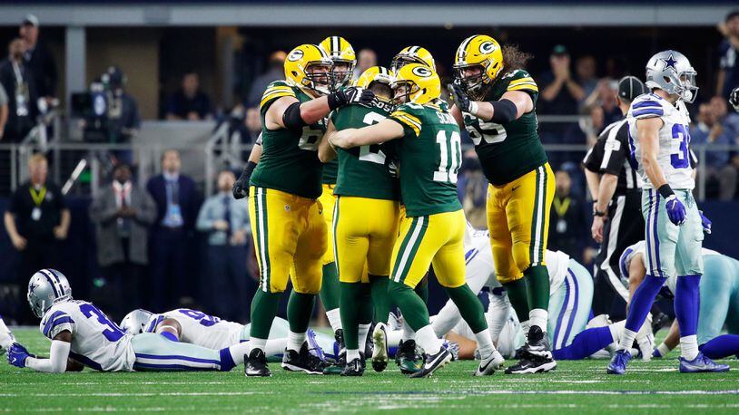 The Green Bay Packers celebrate game-winning field goal as time expired over the Dallas Cowboys in the NFC Divisional Playoff Game at AT&T Stadium Jan. 15, 2017, in Arlington, Texas.