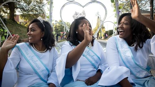 Miss Spelman Janna LeAnn Perry (C) and her two Attendants Zaire Bailey (R) and Haleigh Renèe Hoskins (L) ride in a carriage during the combined homecoming parade of Clark Atlanta University, Morehouse College and Spelman College in Atlanta GA October 21, 2017. STEVE SCHAEFER / SPECIAL TO THE AJC