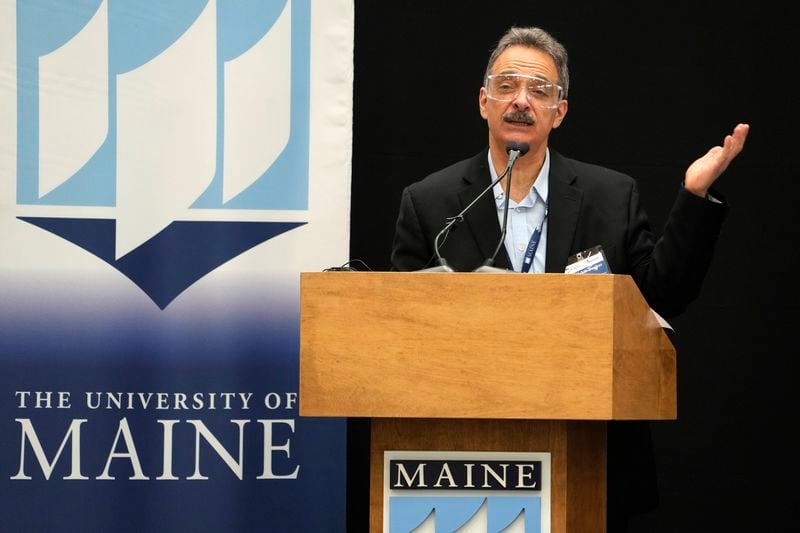 Habib Dasher, director of UMaine's Advanced Structures & Composite Center, speaks at the unveiling of the world's largest 3D printer, Tuesday, April 23, 2024, at the University of Maine, in Orono, Maine. (AP Photo/Robert F. Bukaty)