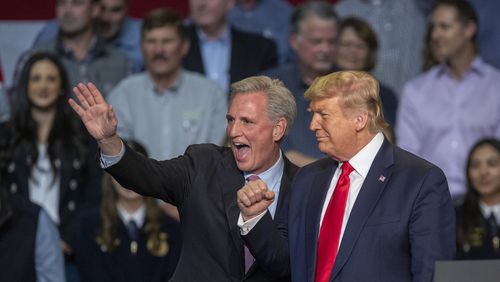 House Minority Leader Kevin McCarthy and U.S. President Donald Trump, attend a legislation signing rally with local farmers on Feb. 19, 2020, in Bakersfield, California. (David McNew/Getty Images/TNS)