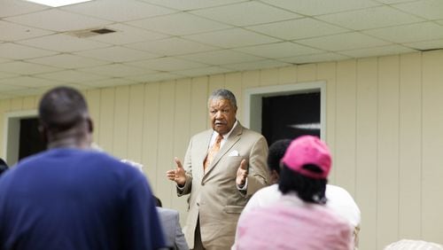 Robb Pitts, who is running for the chair of Fulton County, speaks to a group of people during a candidate forum at the Cliftondale Community Club in College Park, Monday, Oct. 10, 2017, in Atlanta. BRANDEN CAMP/SPECIAL