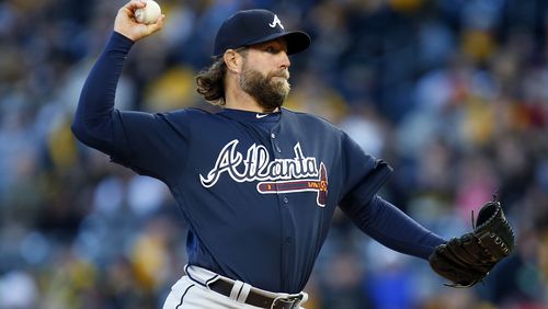 Braves knuckleballer R.A. Dickey, pictured during his April 8 season debut at Pittsburgh, got his second win in four starts on Thursday when he pitched fives solid innings against his former Mets team before leaving the game with a quadriceps strain. (Photo by Justin K. Aller/Getty Images)