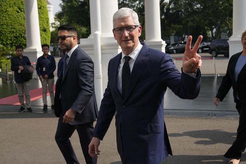 Apple CEO Tim Cook arrives for a meeting with Indonesian President Joko Widodo at the palace in Jakarta, Indonesia, Wednesday, April 17, 2024.(AP Photo/Achmad Ibrahim)