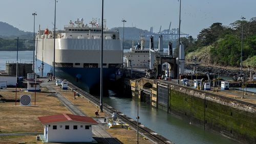 A ship is guided through the Panama Canal's Miraflores locks near Panama City on April 24, 2023.  The scarcity of rainfall due to global warming has forced the Panama Canal to reduce the draft of ships passing through the interoceanic waterway, in the midst of a water supply crisis that threatens the future of this maritime route. (Luis Acosta/AFP/Getty Images/TNS)