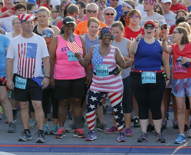 In this file photo, non-elite runners at the starting line. The 50th running of the AJC Peachtree Road Race in Atlanta will take off Peachtree Street near Lenox Mall. BOB ANDRES /BANDRES@AJC.COM