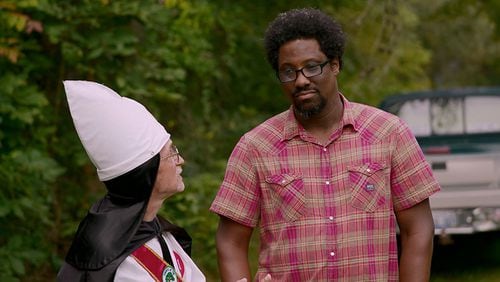 W Kamau Bell meets some KKK folks who are willing to talk to him without a hood covering their face. CREDIT: CNN