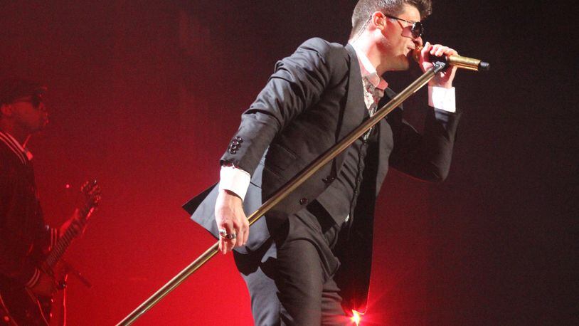 Robin Thicke got close to the crowd from the start of the show.