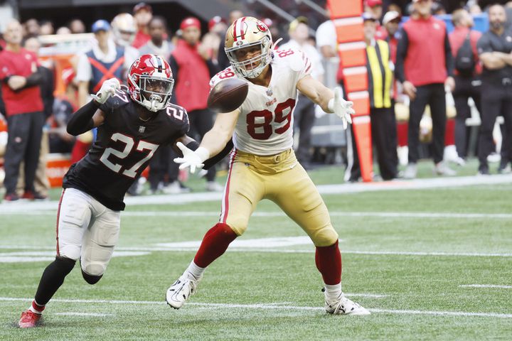 49ers tight end Charlie Woerner cannot catch the ball while being pressured by Falcons safety Richie Grant during the third quarter Sunday in Atlanta. (Miguel Martinez / miguel.martinezjimenez@ajc.com)