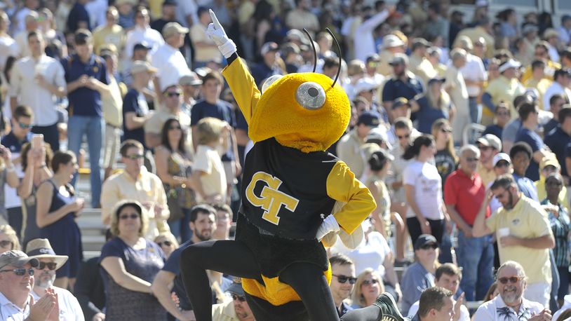 Mascot Buzz gestures to the Tech crowd after performing push ups during a football game. SPECIAL/Daniel Varnado