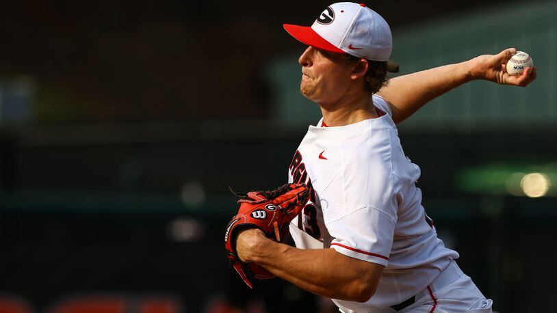 Georgia pitcher Cole Wilcox (13) delivers during an NCAA regional game against Florida State Sunday, June 2, 2019, in Athens.