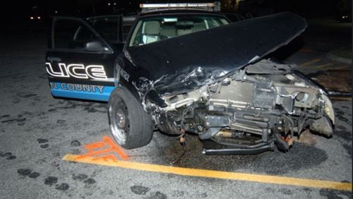 A Fulton County police car crashed with a suspect inside.