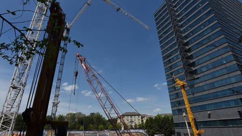 Construction is underway at Three Alliance Center, an office tower being built in Buckhead as vacancy rates drop.