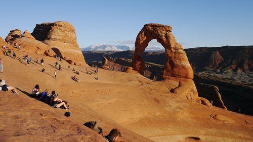 Delicate Arch in Arches National Park is a popular place to watch the sun go down. NEIL BALLENTINE/CHICAGO TRIBUNE/TNS