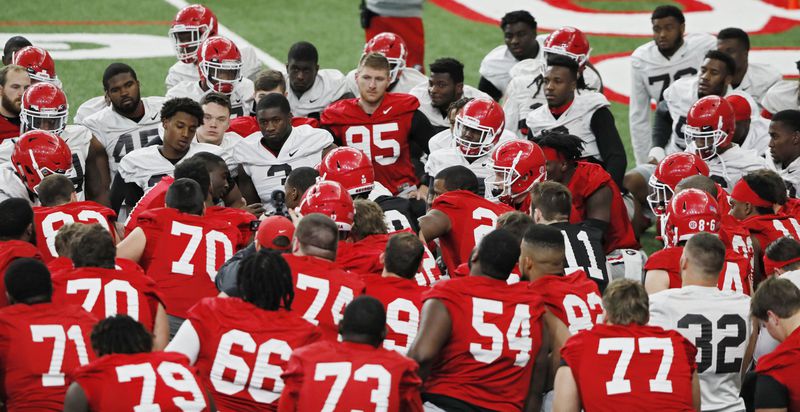 After fulfilling media day obligatiohs in Atlanta, the UGA football team traveled back to Athens for practice Saturday afternoon.  BOB ANDRES  /BANDRES@AJC.COM