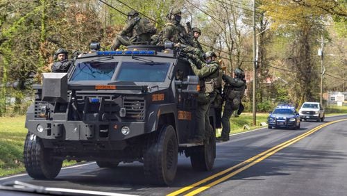 A Georgia State Trooper team drives near Intrenchment Creek Park in Atlanta on Monday, March 27, 2023. Agencies from across metro Atlanta, along with state agencies, were conducting a clearing operation of Intrenchment Creek Park led by DeKalb County Police. (i(Arvin Temkar / arvin.temkar@ajc.com)