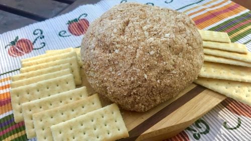 For a retro-style treat, bring out an Apple Pie Cheese Ball with butter crackers. LIGAYA FIGUERAS / LFIGUERAS@AJC.COM
