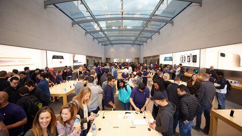 Customers are introduced to the iPhone X at the Apple Palo Alto store. (Apple Inc.)
