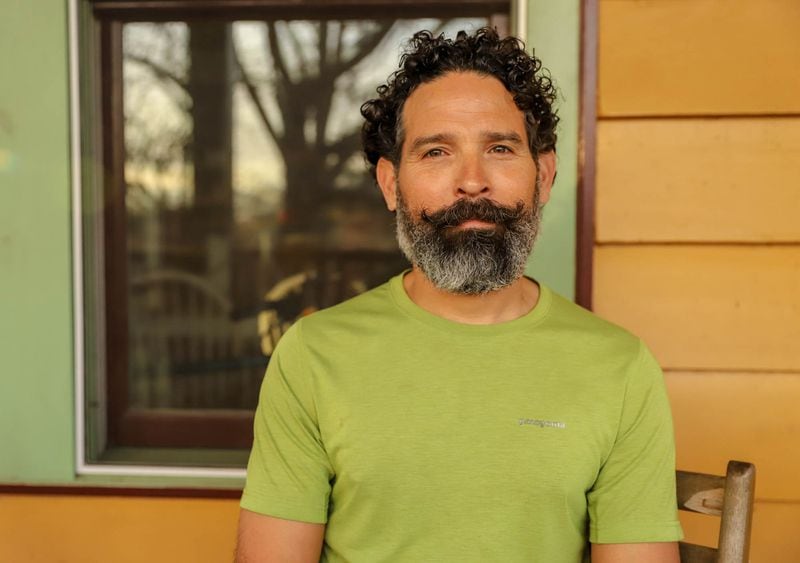 Angel Poventud purchased his bungalow in Atlanta's Adair Park neighborhood in 2011 and spent $150,000 on the renovations, which took 20 months. Poventud is a freight train engineer and conductor for CSX and a community activist.