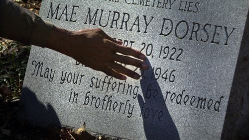 A memorial tombstone for Mae Murray Dorsey, one of four African American victims slain in the 1946 Moore’s Ford lynching, is at Zion Hill Cemetery in Monroe, Ga. Federal and state investigations into the murders, which never resulted in criminal prosecutions, are set to close. (CURTIS COMPTON / STAFF)