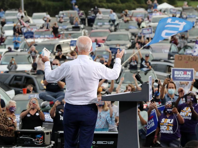 Democratic presidential candidate Joe Biden, shown speaking at a drive-in rally last week at the amphitheater at Lakewood, has increased pressure on President Donald Trump's reelection campaign by making a late push for Georgia. (Curtis Compton/Atlanta Journal-Constitution/TNS)