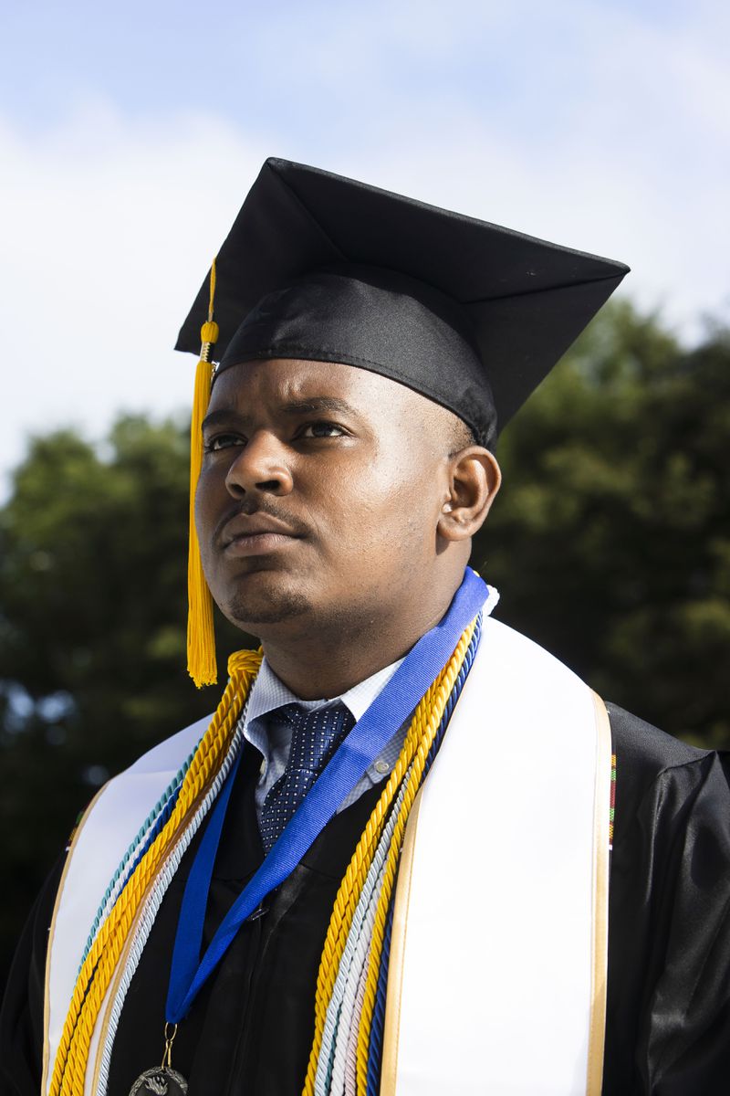 Kareem Michel, an economics major at Morehouse, poses for a portrait before his Morehouse College commencement ceremony Sunday, May 21, 2023, on Century Campus in Atlanta. Michel is part of AltFinance's first cohort to graduate. CHRISTINA MATACOTTA FOR THE ATLANTA JOURNAL-CONSTITUTION