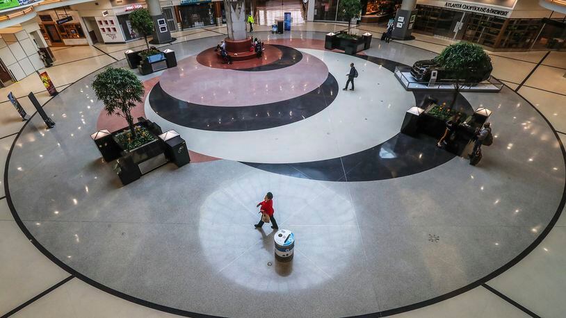 Hartsfield-Jackson International Airport was nearly empty in early April 2020. The year will be remembered for the enormous loss and disruption that the pandemic brought. (JOHN SPINK/JSPINK@AJC.COM)