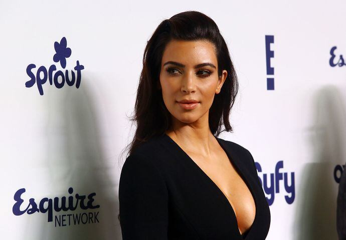 Kim Kardashian, BBM handle MrsKWest, bought Kanye a Lamborghini but still uses a blackberry.