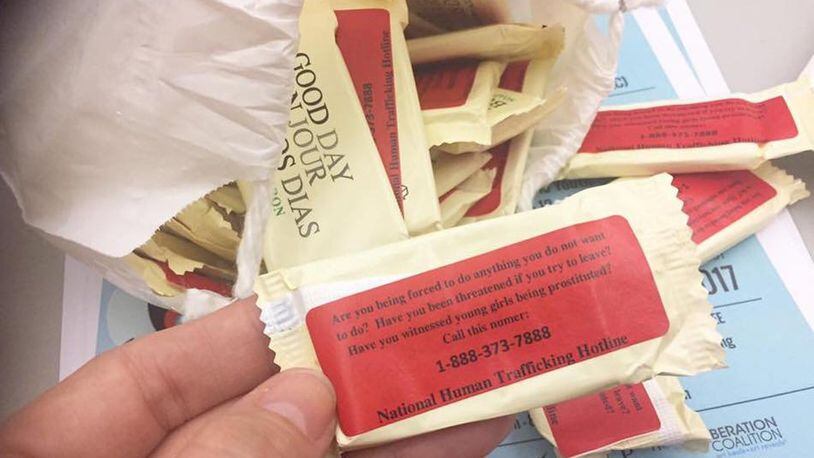 S.O.A.P. (Save Our Adolescents from Prostitution) volunteers will place small bars of soap in the bathrooms of busy commercial areas, such as hotels, ahead of the Super Bowl. Labels on the back provide a hotline number for victims or advocates to call. (handout photo)