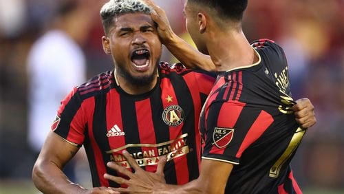 Atlanta United forward Josef Martinez celebrates with Pity Martinez after a goal against St. Louis during the U.S. Open Cup quarterfinals soccer match last month at Fifth Third Bank Stadium in Kennesaw.