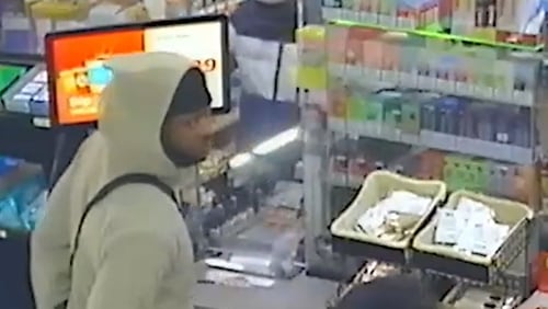 Atlanta police released surveillance footage of a suspect accused of fatally shooting a 42-year-old man at a northeast Atlanta gas station on Christmas Eve.