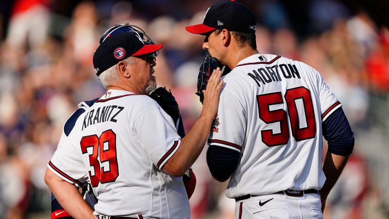 Braves pitching coach Rick Kranitz (39) talks to pitcher Charlie Morton (50) during the fourth inning  against the Washington Nationals, Monday, May 31, 2021, at Truist Park in Atlanta. (John Bazemore/AP)