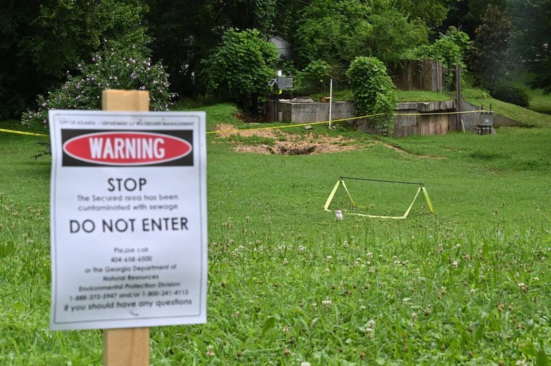 An area between Atlanta Avenue and Ormond Street near Greenfield Street is secured due to sewage contamination in Peoplestown on Tuesday, July 7, 2020, after recent flooding. HYOSUB SHIN / HYOSUB.SHIN@AJC.COM