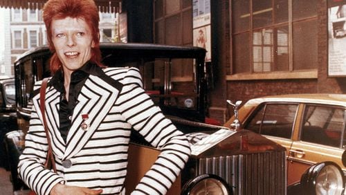 Bowie and his Rolls, circa 1973.