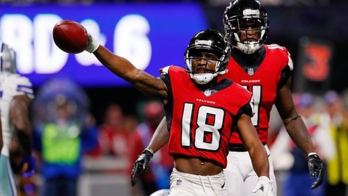 Falcons wide receiver Taylor Gabriel signals a first down during the second half against the Cowboys at Mercedes-Benz Stadium on November 12 in Atlanta.